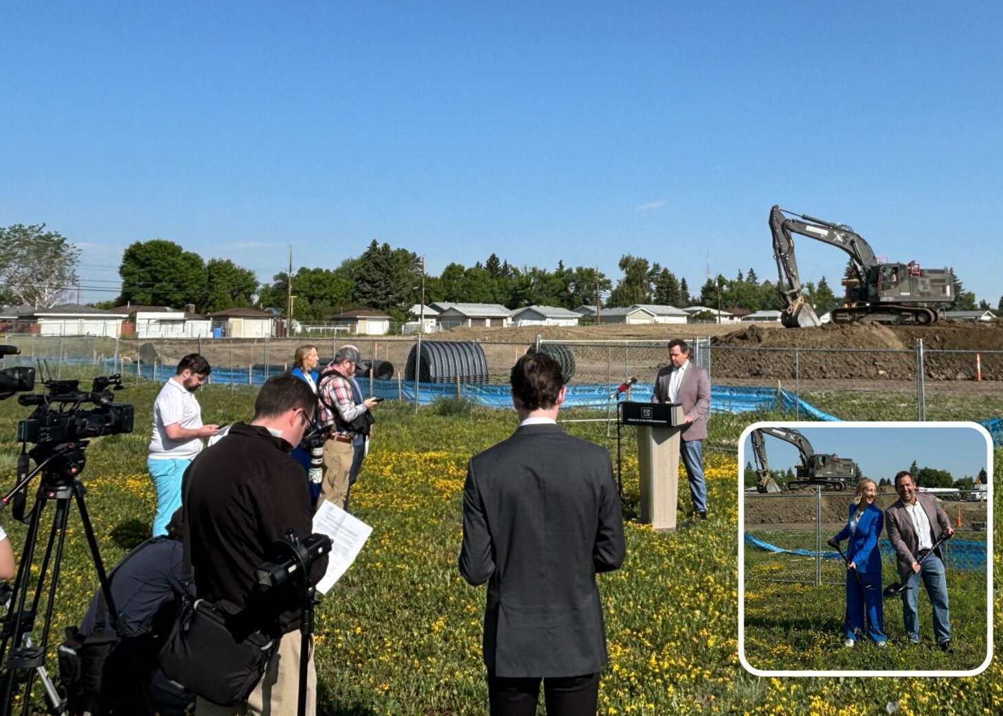 announcement of project in open field with reporters Attainable Homes Calgary